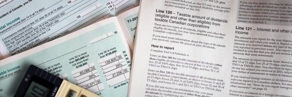 Canadian income tax booklet and papers.