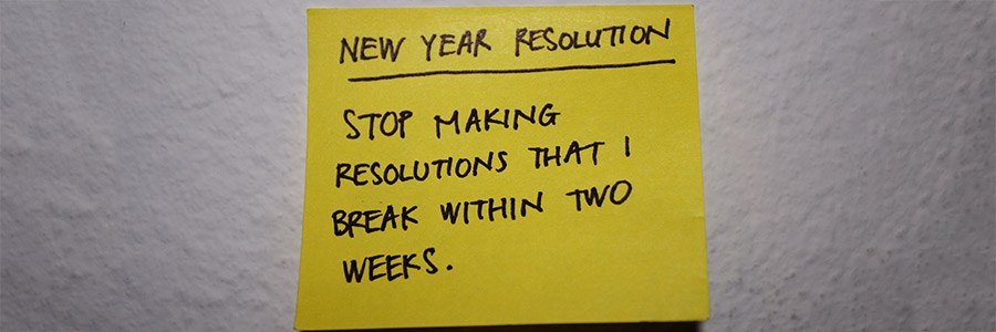 A post-it note on a fridge that says "New Year Resolution: Stop making resolutions that I break within two weeks".