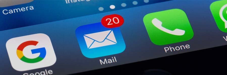 Close-up of email and phone icons on a smartphone