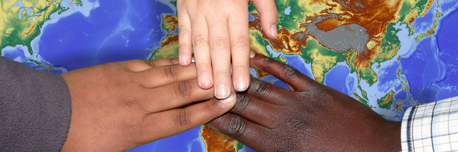 Hands of kids from different races